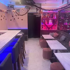 Akihabara Concept Cafe RE:FIRST interior bar counter and sofa 2