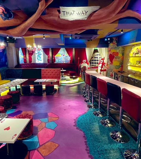 Akihabara Concept Cafe Alice × Alice interior bar counter and sofa