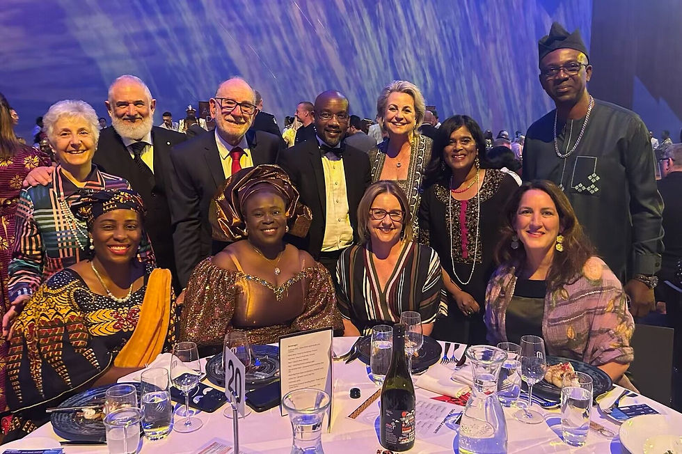 Abiola with Premier of Victoria Jacinta Allan at the ECCV's Africa Day Gala table.