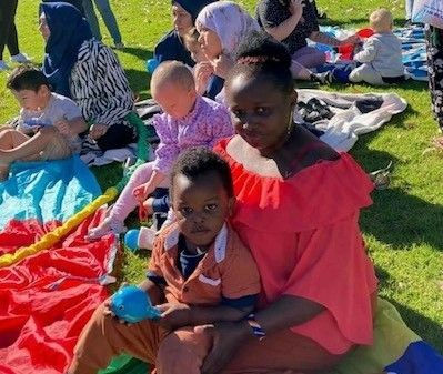 Hub participants enjoying a day out at ‘Playgroup at the Park’.