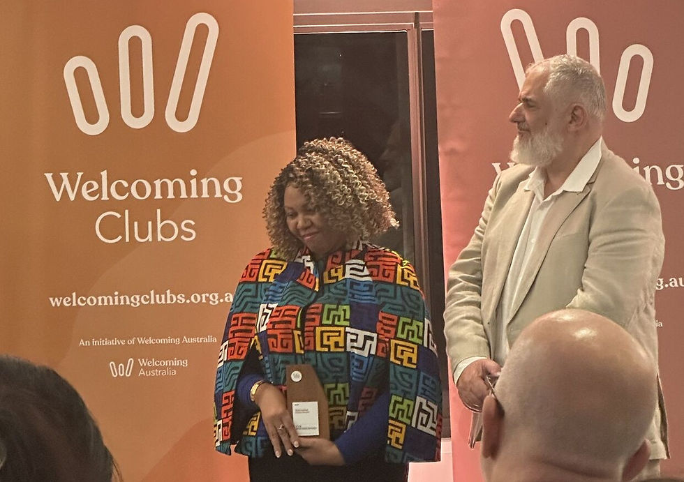 Perth's Eva Mwakichako was presented with a Welcoming Cities Award at the Symposium's Opening Reception.