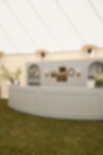 Elegant curved bar rental from Mad Honey Rentals, perfect for upscale events and weddings in Chattanooga, TN.