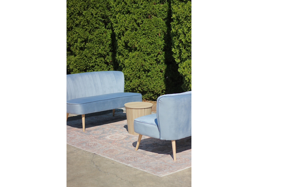 Thumbnail: Chic blue velvet settee available for specialty event rentals from Mad Honey Rentals in Chattanooga, TN, ideal for photo ops