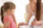 SLP Helping Little Girl Patient.jpg