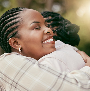 happy-black-woman-hug-with-mother-embrace-love-support-together-nature-young-african-femal