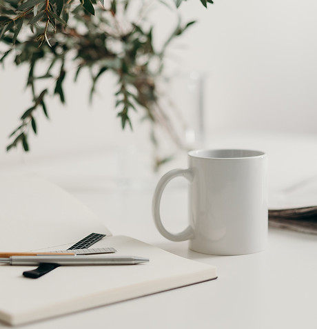 notepad coffee cup and laptop.jpg