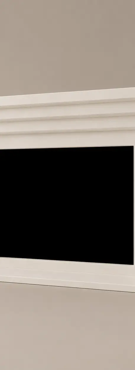 Model 447 stone fireplace surround in warm ivory cast stone, shown from a restrained right-side perspective in quality stone