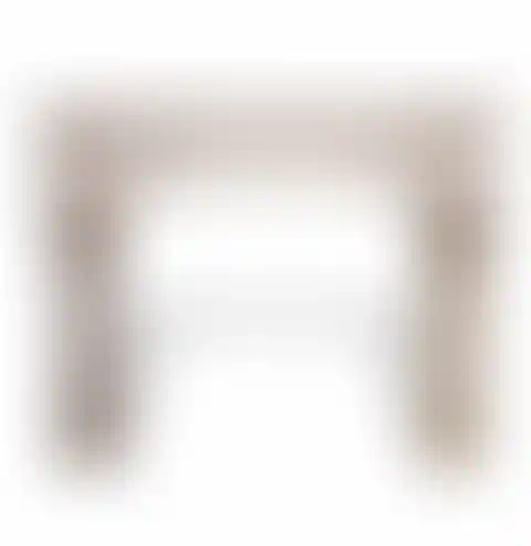 Elegant stone fireplace mantel with classic architectural detailing, perfect for adding a touch of sophistication to any room