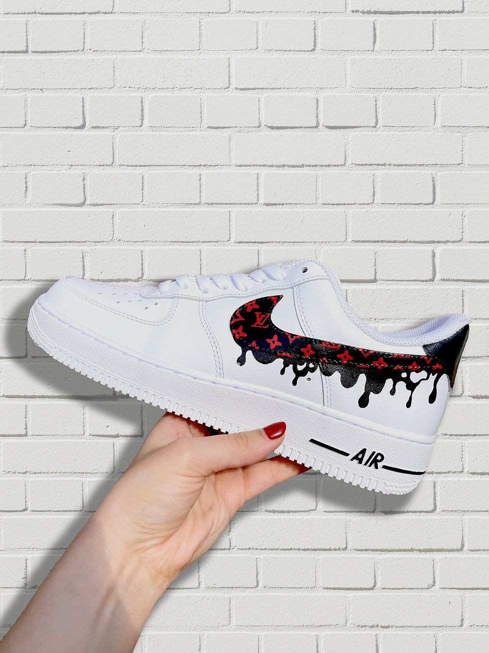 Custom painted Nike Air Force 1 shoes with designer LV inspired artwork.