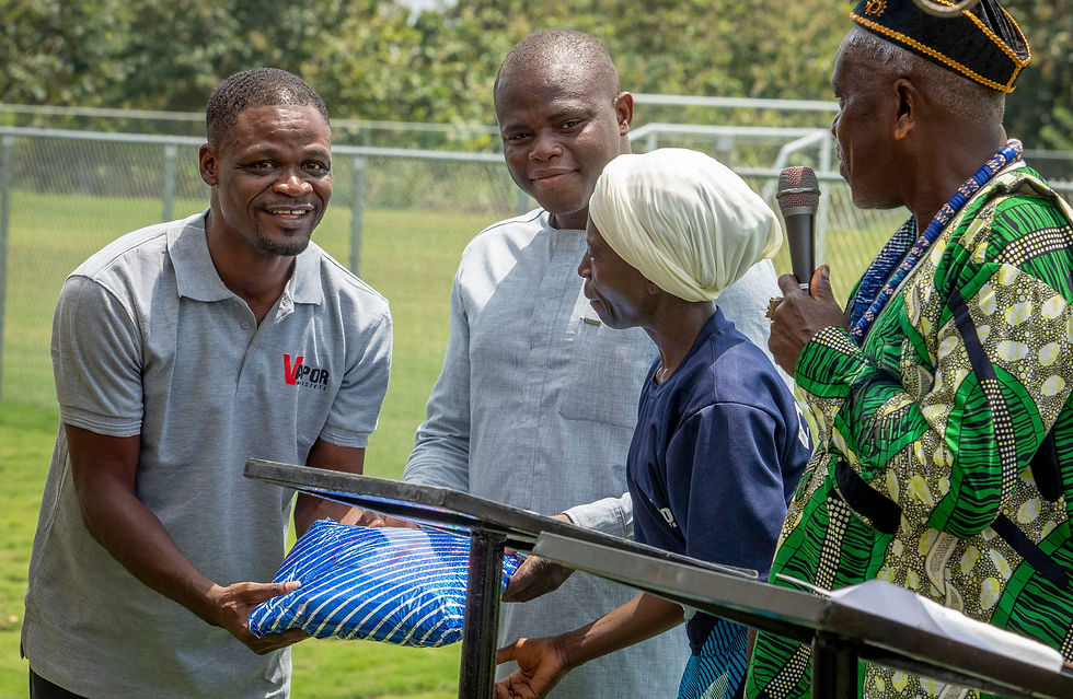 west africa regional manager hands or receives a package