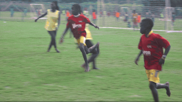 children play soccer