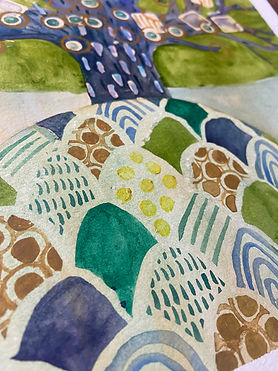 Close-up of watercolor patterns below tree