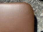 Amys Brown Leather Closeup with Rock