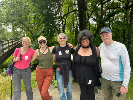 A group of walkers smile for the camera