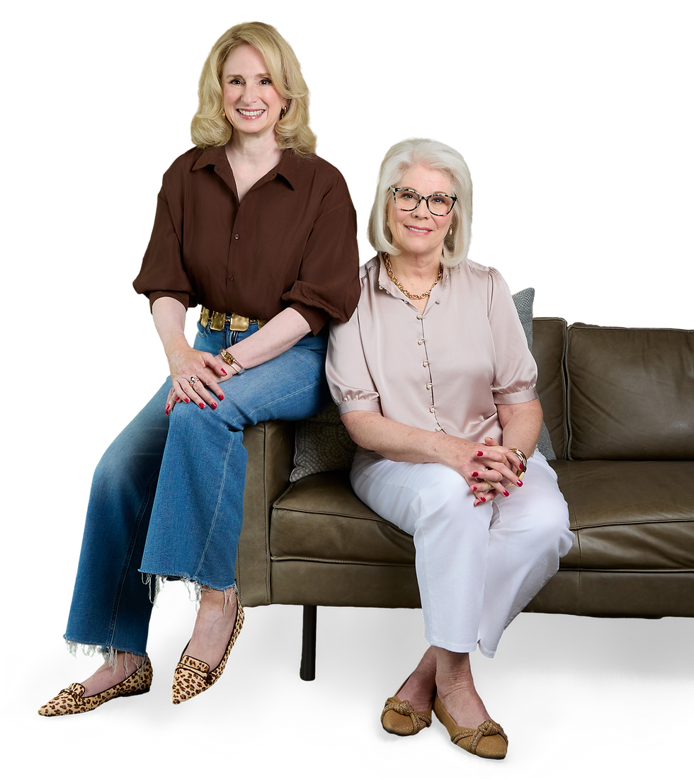 Kathy and Lori founders of ellevae sitting on a couch