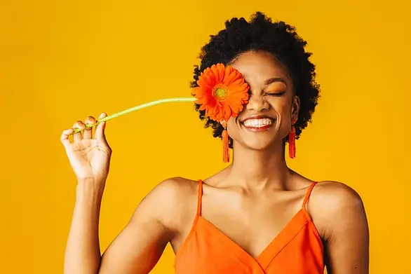 portrait-happy-young-woman-holding-600nw-1691989951.webp