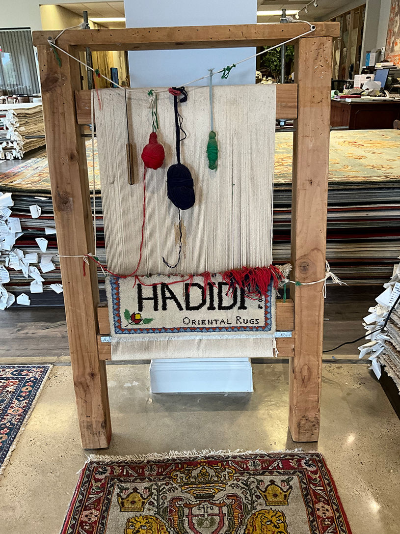 Hadidi rug gallery showroom sign