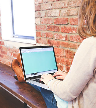 Woman Using Laptop