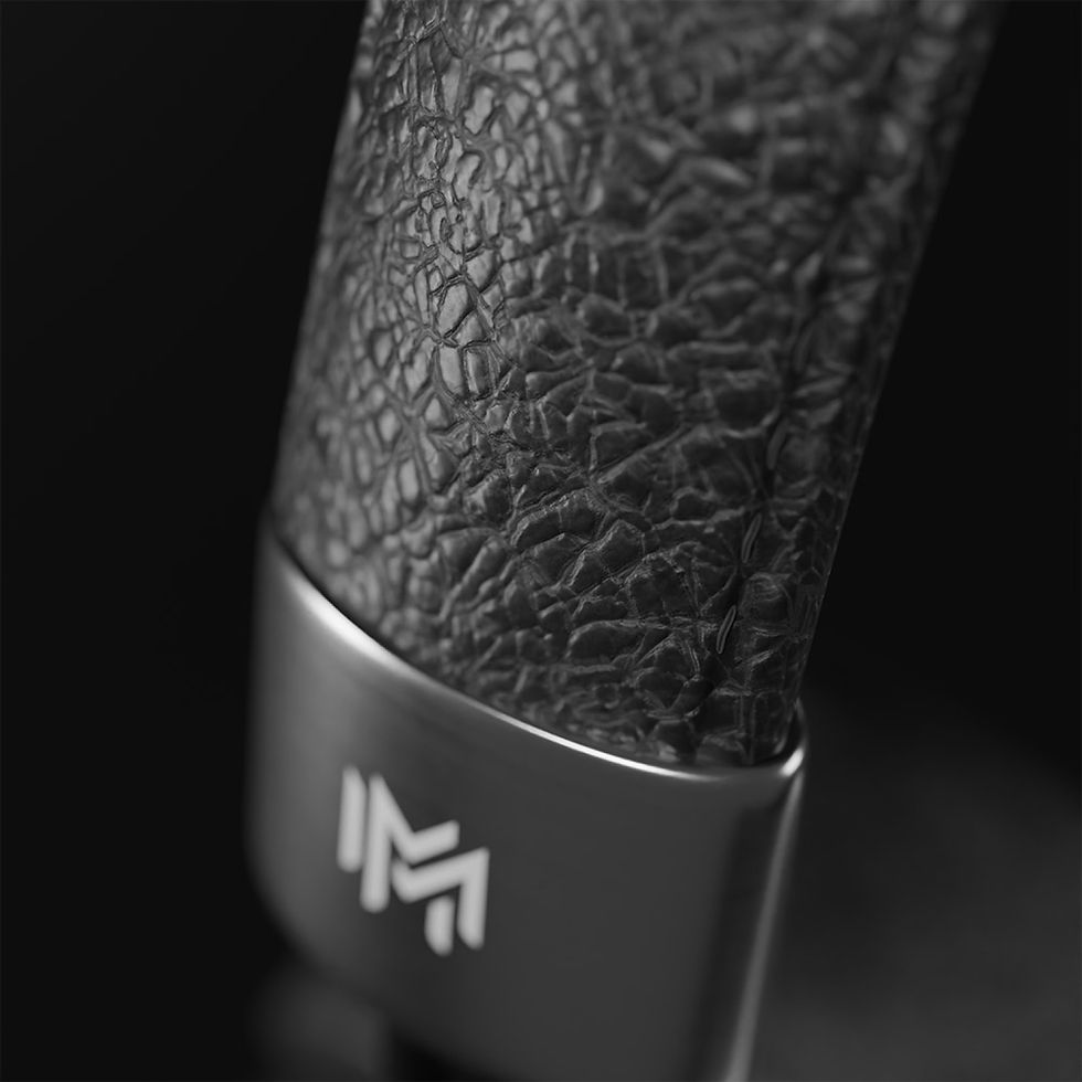 MOWE logo on the textured leather headphone headband