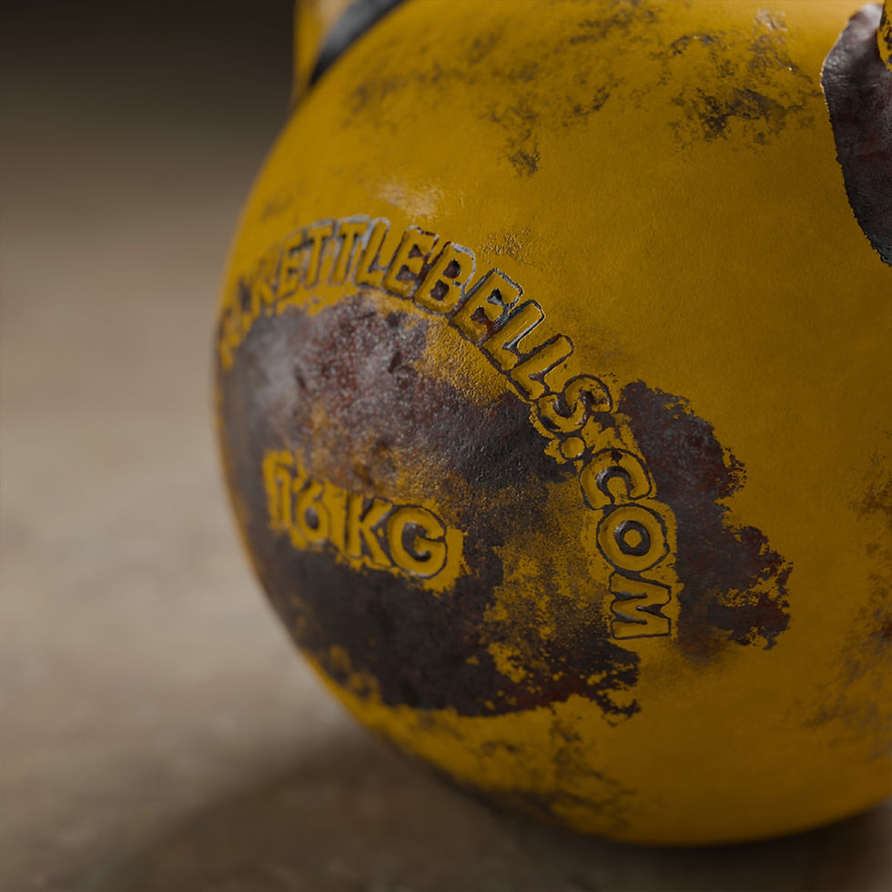 Close-up of a worn yellow 16kg kettlebell at Delta Gym.