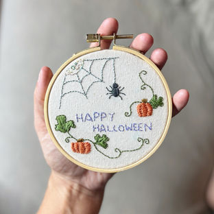 Halloween themed decorative embroidery on embroidery hoop