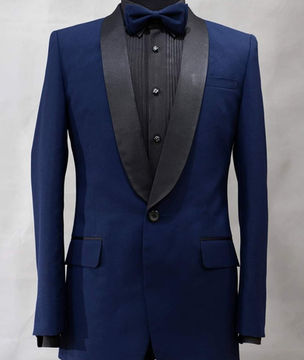 midnight blue tuxedo with black shawl lapel and bow tie on mannequin, available for rental ₱1400 per set and bespoke tailoring