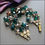 Thumbnail: Book Piece 1950s Trifari Emerald Crystal Vintage Bracelet 3 Strand