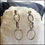 Thumbnail: 1980s Elliptical Silver Hoop Dangle Vintage Pierced Earrings