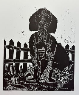 Black and White carving of a dog sitting in a garden with overalls on