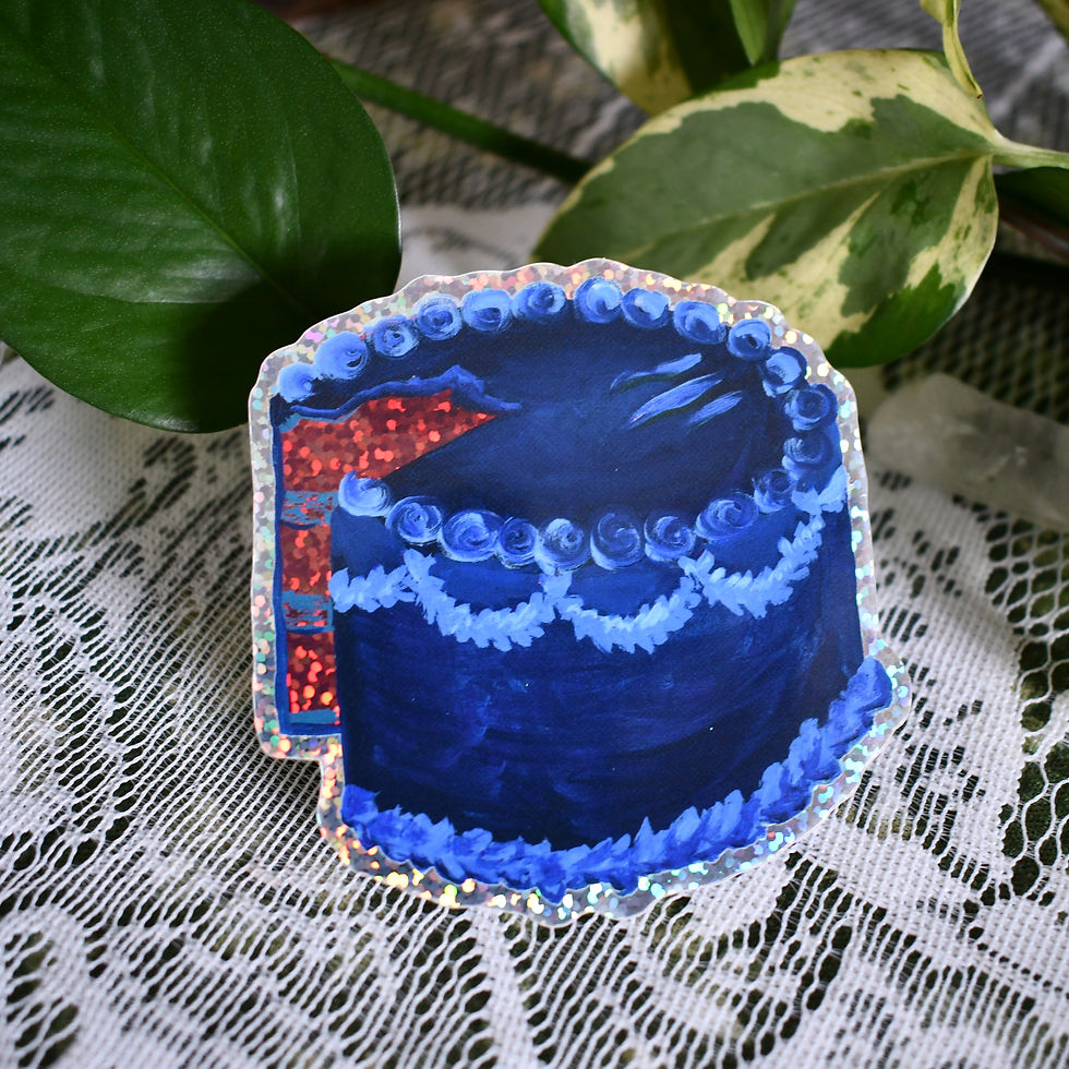 Thumbnail: Blue cake sticker with a slice taken out on a white lace background.