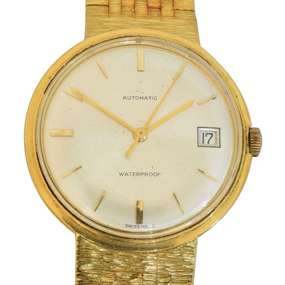 A 18-carat gold necklace with a concealed pendant watch, dating back to 1971.