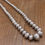 Thumbnail: Vintage Sterling Silver Handmade Stamped Saucer Bead Necklace