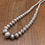 Thumbnail: Vintage Sterling Silver Handmade Stamped Saucer Bead Necklace