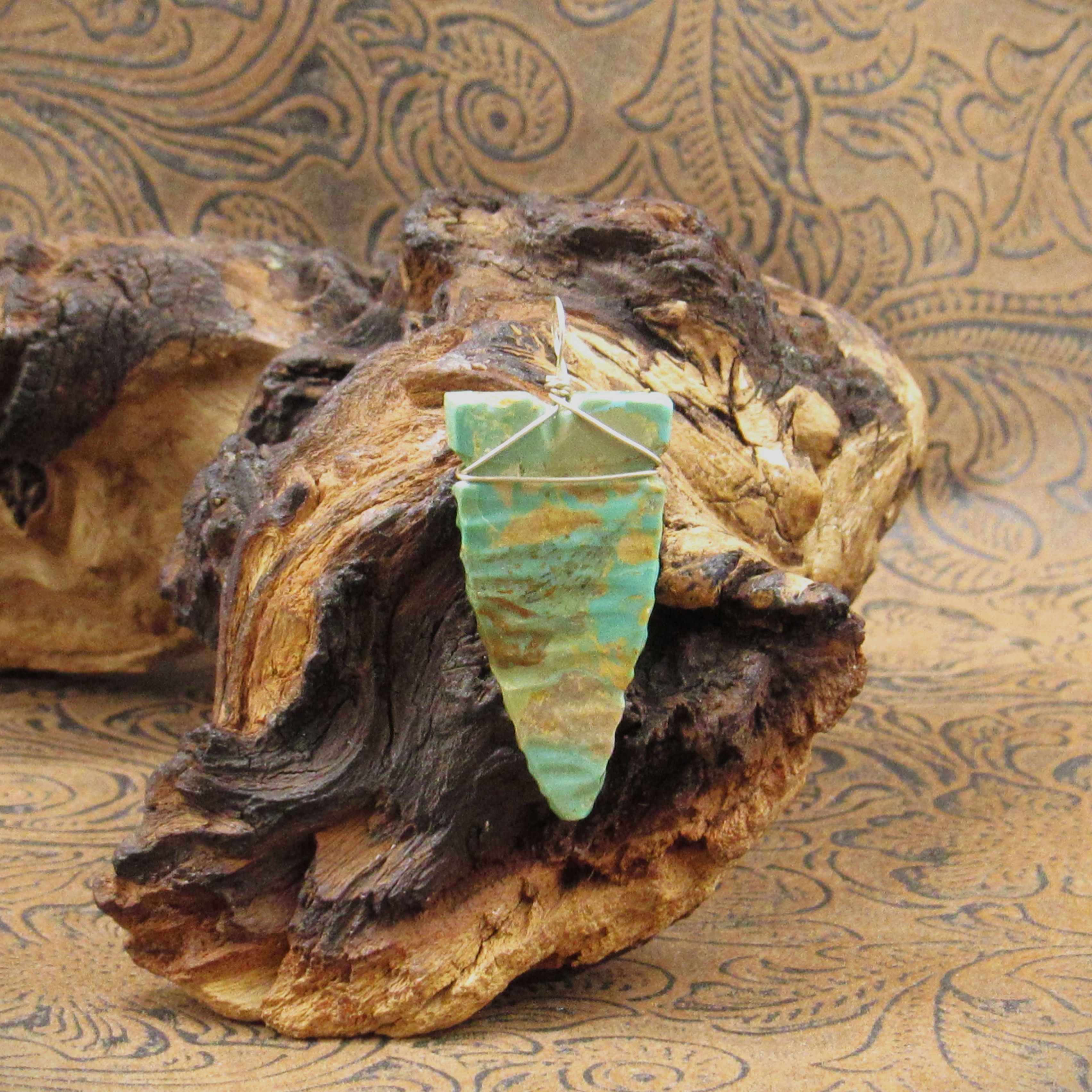 Carved Green Turquoise Arrowhead Shaped Wire Wrap Pendant