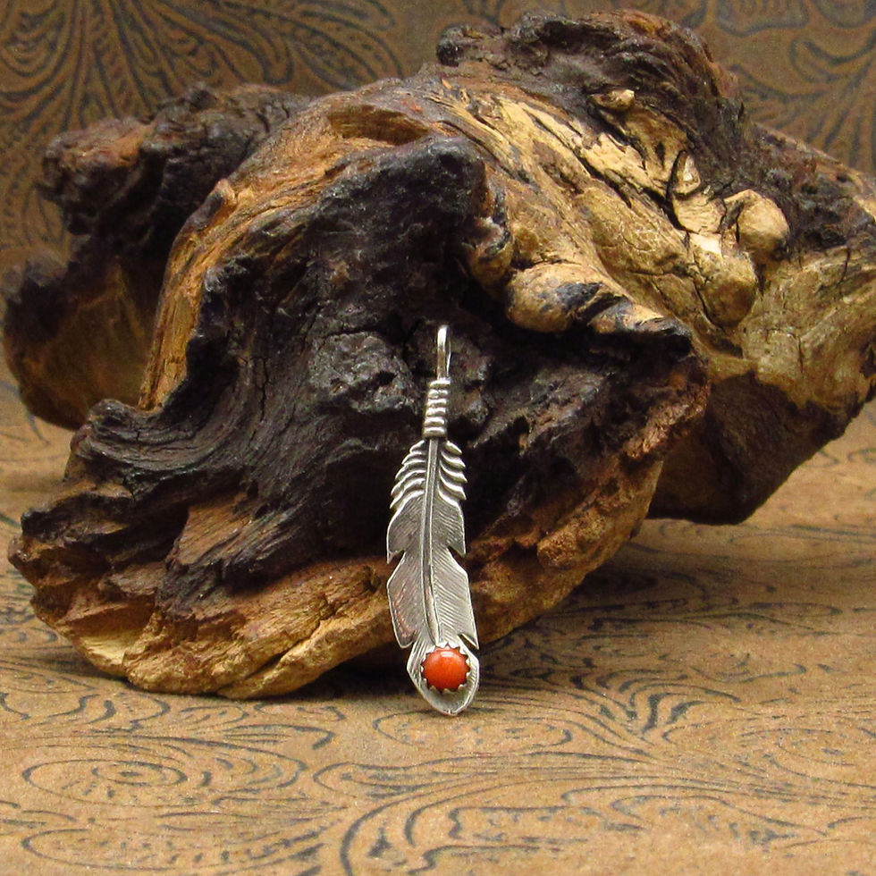 Sterling Silver Feather Pendant With Round Coral Stone
