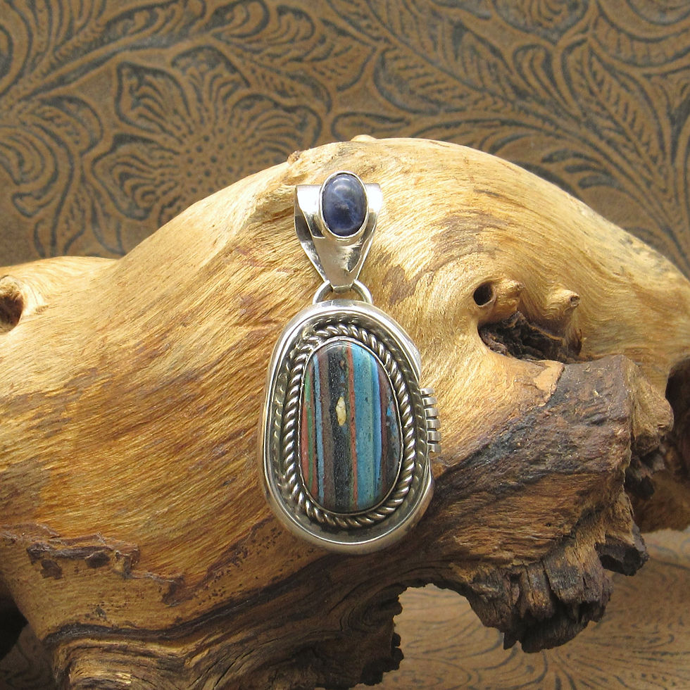 Sterling Silver Rainbow Calsilica Stone Pendant With Lapis