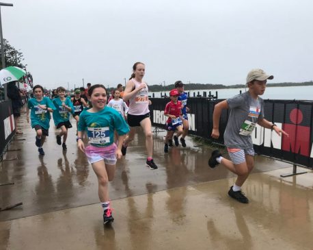 Ironkids – all smiles even in the pouring rain!
