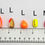 Thumbnail: Large Bullet Floats - Orange and Green with Dots