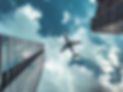 black%20and%20white%20airplane%20above%20high-ris%20ebuildings_edited.jpg