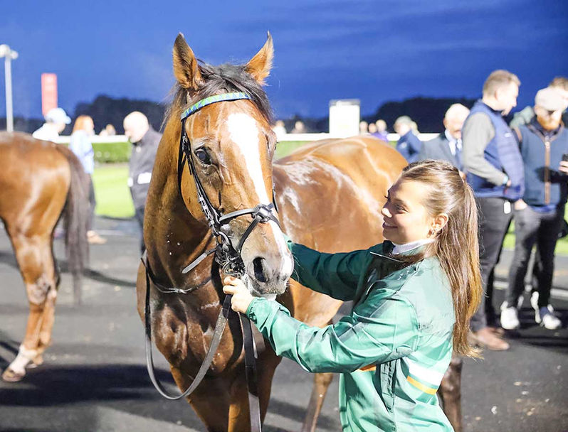 Tuco Salamanca winning racehorse with Libby his groom