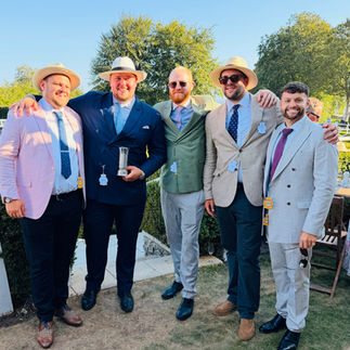 Pompey Ventures owners of winning racehorse French Affair celebrating at Goodwood