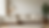 Eye-level view of a clean beige sofa in a bright living room