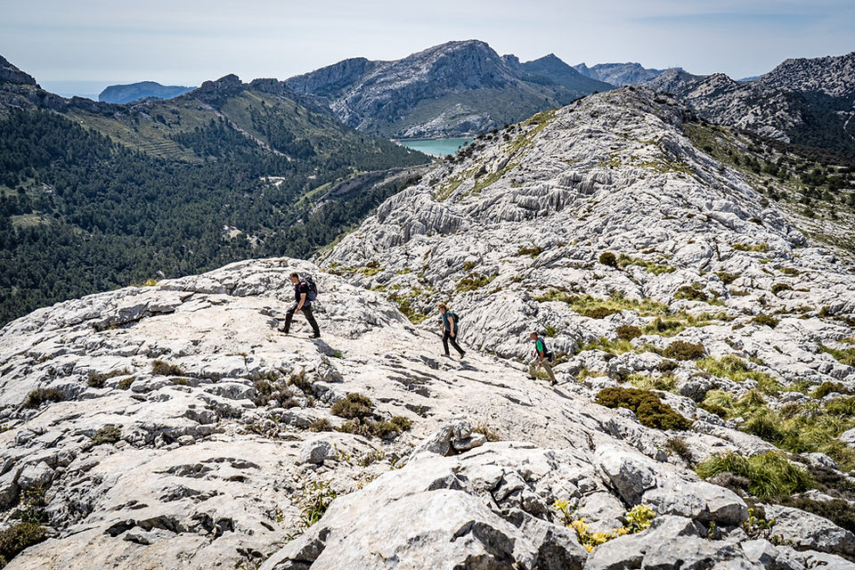 Alpine terrain Ascent Summit Puig des ses Vinyes 1.097m in Mallorca Cuber mountains Tramuntana hiker lake