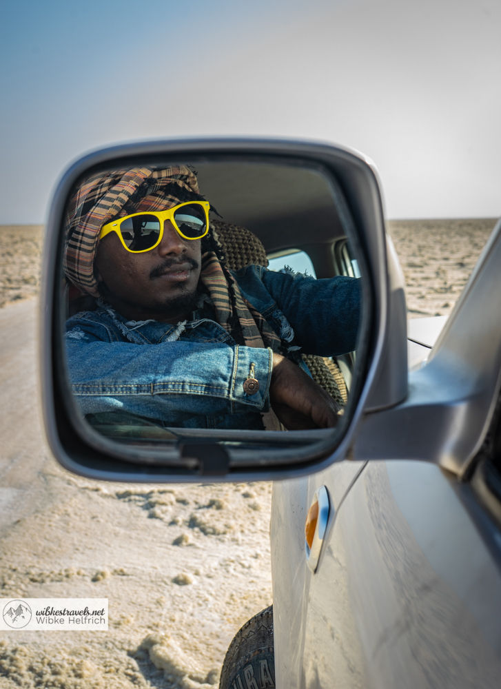 In Danakil depression Ethiopia they're only bumpy dirt roads. You need a good Jeep and a skilled driver to get around