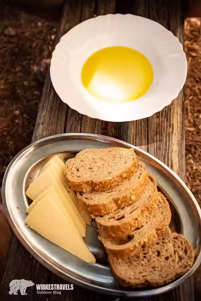 Olive oil, bread and cheese.