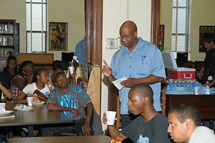E4E Larry Lewellyn speaking with students at Washington Prep High School