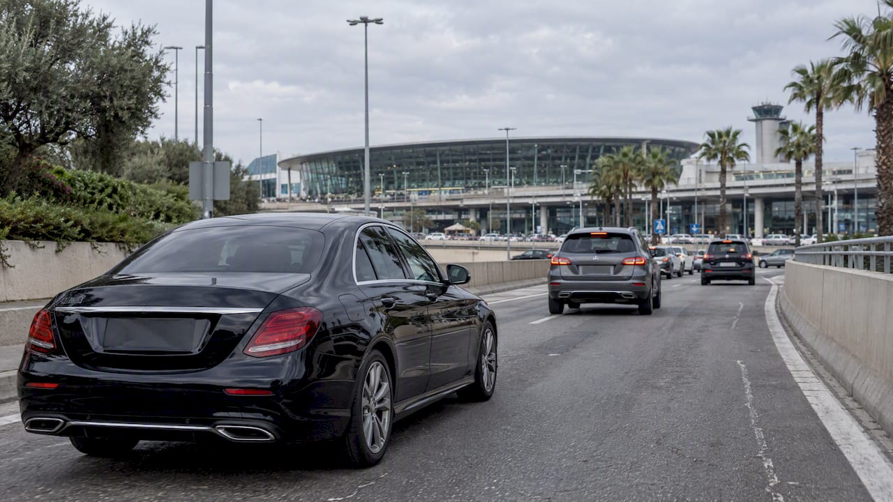 Private transfer car in traffic near Nice Airport