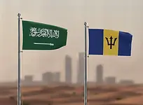 Saudi Arabia flag and Barbados flag side by side for Saudi Arabia E-Visa application.
