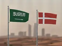 Saudi Arabia flag and Denmark flag side by side for Saudi Arabia E-Visa application.