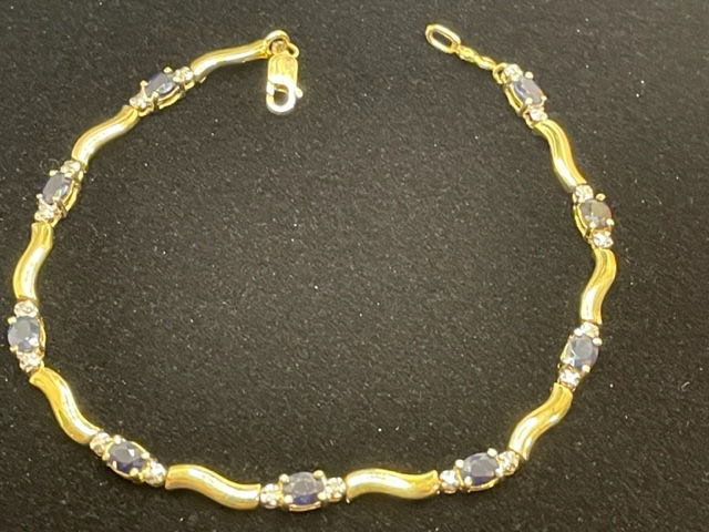 Thumbnail: pre owned 10k gold diamonds and sapphire tennis